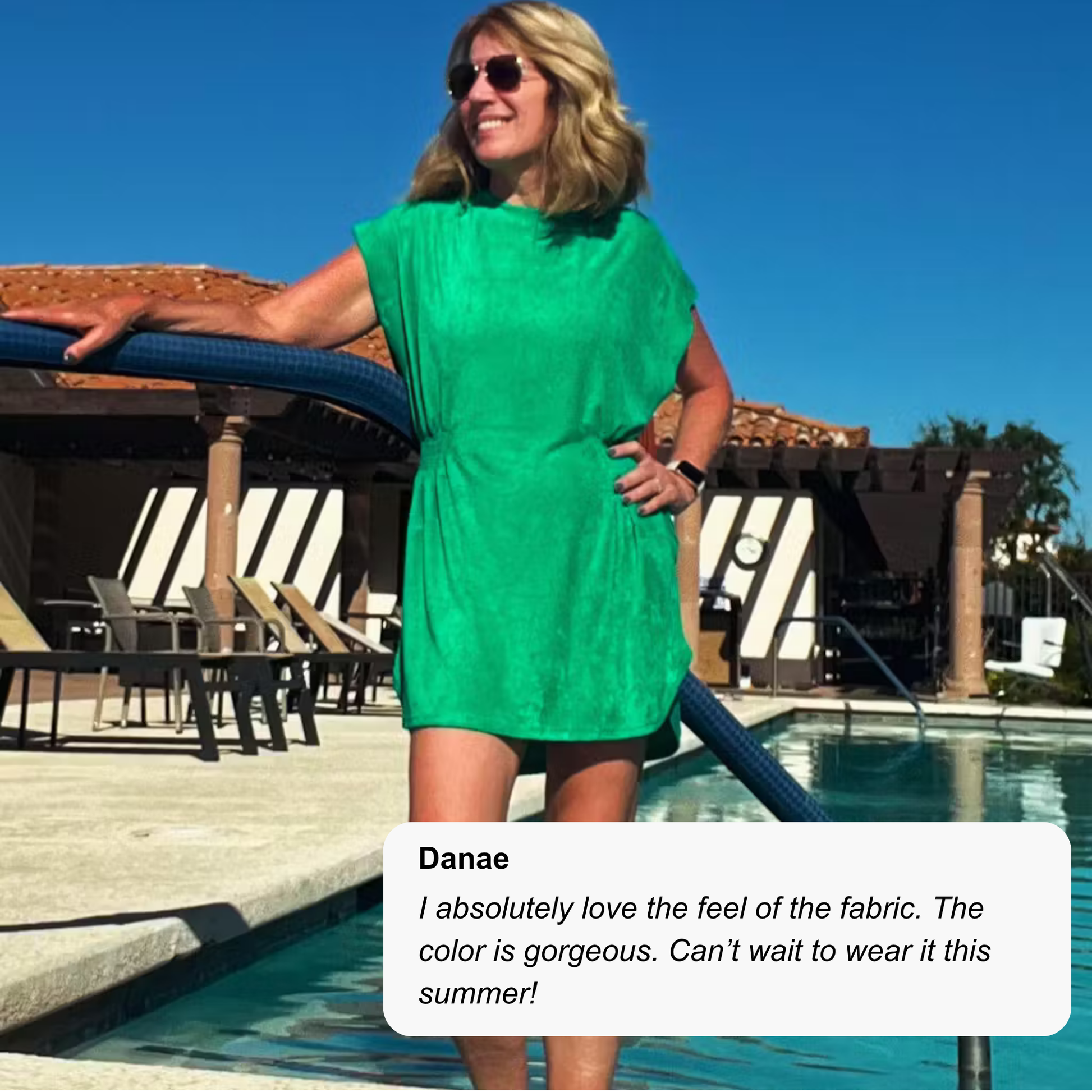 Review information and image of a woman standing in a pool in Bette green terry cloth cover up