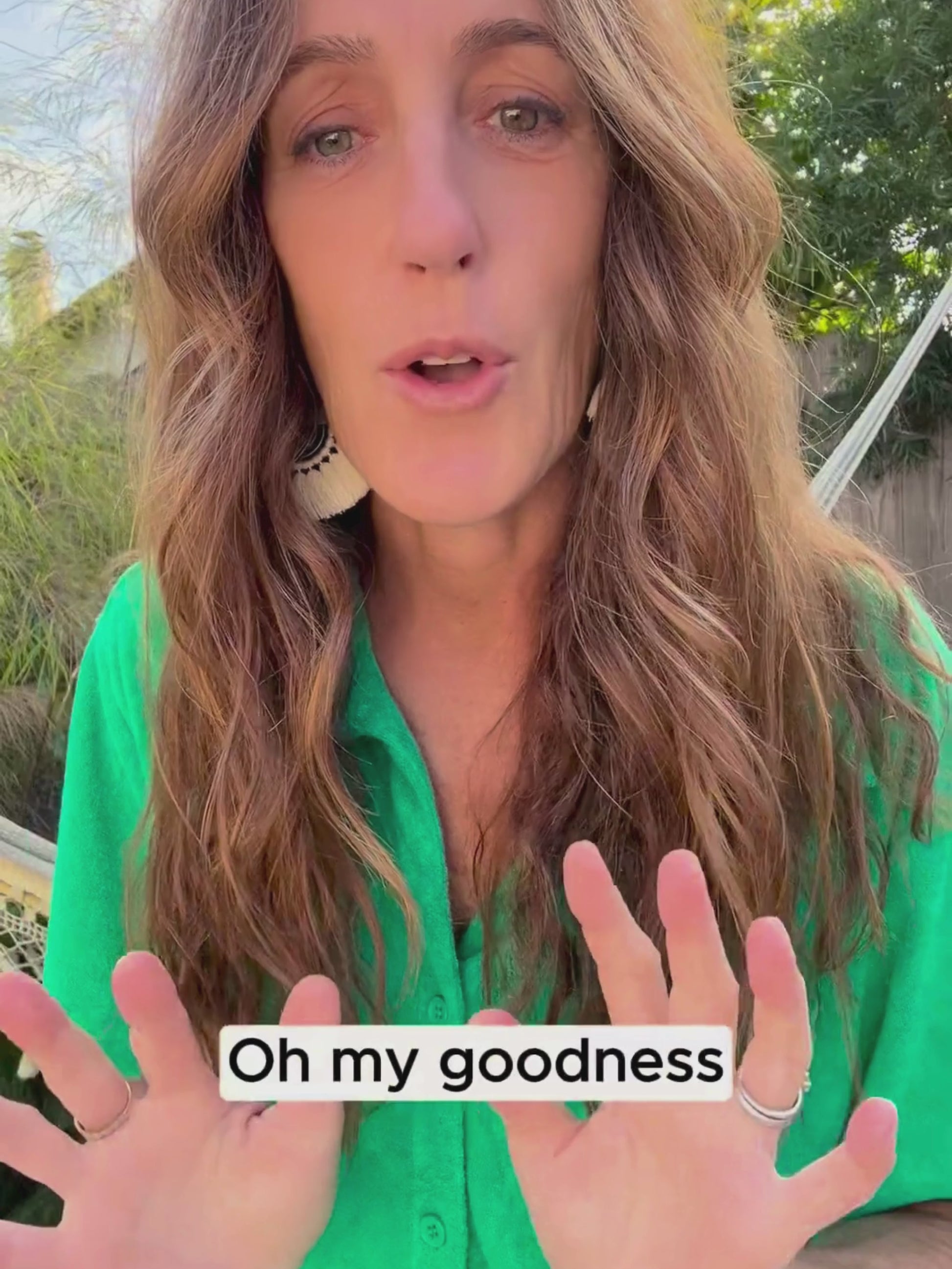 Woman talking about terry cloth shorts set.