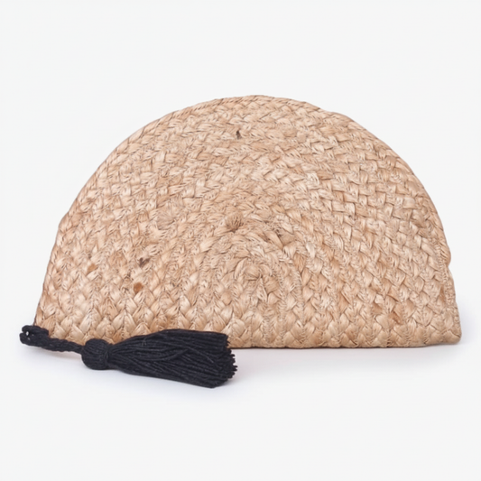 Jute woven Clam Clutch with black tassel handmade in India on white background