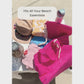 Video of someone packing a pink terry cloth tote for the beach