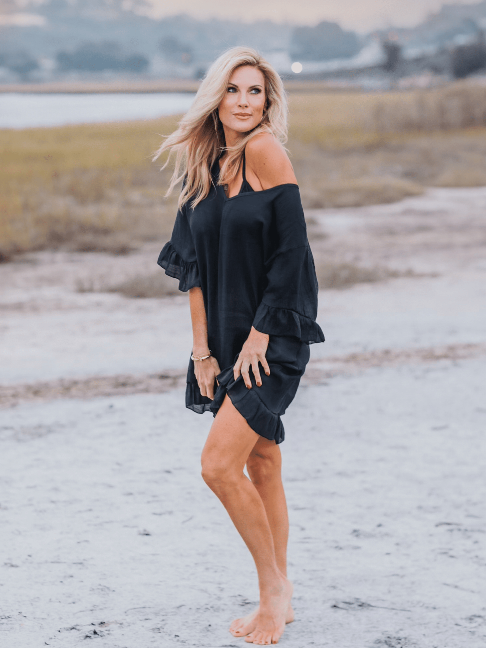 woman posing wearing Moorea Coverup - Black - Bette